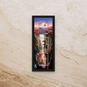 May include: A black framed display featuring three trading cards with colorful illustrations. The background art depicts a canyon scene with a sunset. The cards are visible through clear protective covers.