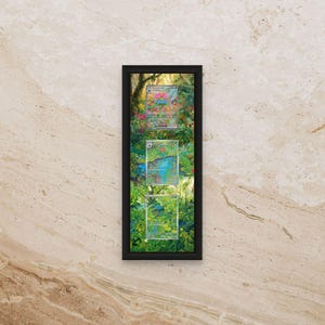 May include: A framed artwork featuring three transparent cards with colourful floral and nature-themed designs. The cards are set against a vibrant green and brown background, framed in a sleek black frame. The artwork is displayed on a beige wall.