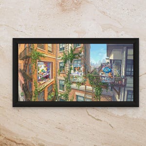 May include: A framed horizontal wall art print depicting a detailed urban scene of brick apartment buildings with fire escapes, lush green climbing vines, and three distinct windows showcasing colorful interior rooms under a clear blue sky.