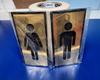 Male and Female Toilet signs in mirror gold finish on black 100 x 200mm