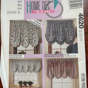 May include: A McCall's Home Dec in a Sec sewing pattern envelope, number 4620, featuring four variations of gathered balloon shades and valances. The envelope displays illustrations of window treatments with floral, striped, and plaid fabric designs.