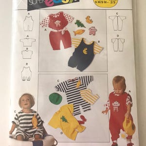 May include: A Burda Super Easy sewing pattern for baby and toddler clothing. The pattern shows illustrations of various outfits, including rompers, shirts, and a striped ensemble. The pattern includes sizes 6M/9M to 2/3.