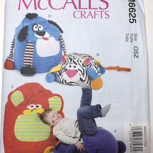May include: McCall's Crafts pattern M6625 with designs for animal-shaped bean bag chairs. The pattern includes a blue dog, a zebra, and a red monkey. The bean bags are shown with a child playing on them.