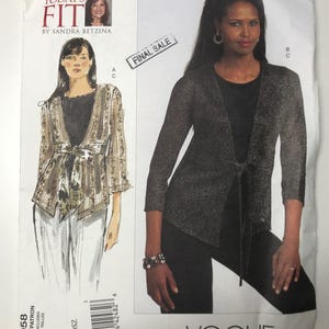May include: Vogue Patterns sewing pattern V1058. The pattern shows a woman in a sparkly, open-front cardigan with a tie closure. The pattern includes the text "FINAL SALE" and "TODAY'S FIT BY SANDRA BETZINA".