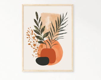 Può includere: Una stampa incorniciata con un design astratto che presenta uno sfondo in stile acquerello in tonalità di arancione e marrone. La stampa include foglie verdi stilizzate e una forma geometrica nera e arancione.