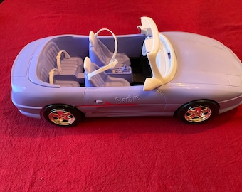 VOITURE NEUVE BARBIE DECAPOTABLE AVEC LA POUPEE