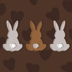 Puede incluir: Tres conejos de dibujos animados sentados de espaldas. Los conejos están delineados en negro y rellenos de marrón, blanco y gris. Los conejos están sentados sobre un fondo marrón.