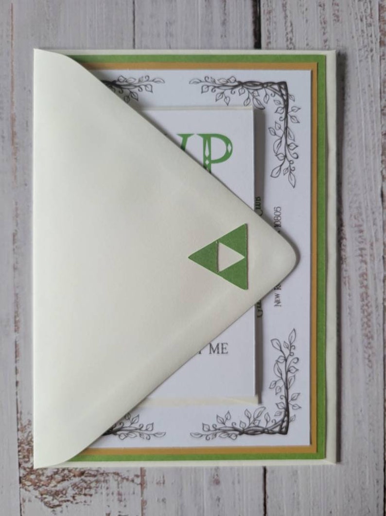 Zelda Wedding Invitation | Green Cardstock with Gold Hyrule Crest on Back | Ivory Envelope with Green Triforce Diecut | RSVP Card with Rupees | Reception Card | Ivory RSVP Card