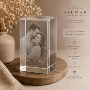 May include: A rectangular crystal photo block measuring 60 x 60 x 100 mm, featuring a 3D laser-engraved image of a couple embracing. The glass block includes the engraved text Forever & Always and the date 05.20.2023 on the front surface.