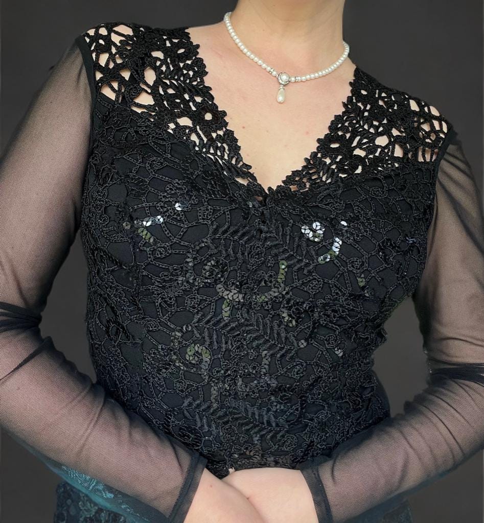 elegant black tops for evening