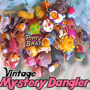 Peek a pooh ! vintage winnie pooh phone dangler rubber phone charm 2000 y2k rare pooh animal wear winnie pooh jellyfish chip & dale tweety