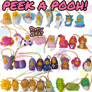Peek a pooh ! vintage winnie pooh phone dangler rubber phone charm 2000 y2k rare pooh animal wear winnie pooh jellyfish zodiac signs