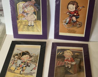 Four Small Campbells Soup Kids matted Prints