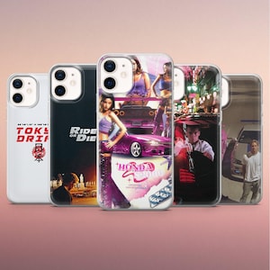 May include: A collection of five clear phone cases featuring images from the movie "The Fast and the Furious: Tokyo Drift." Designs include movie stills, text, and a pink car. The cases are displayed against a gradient pink background.
