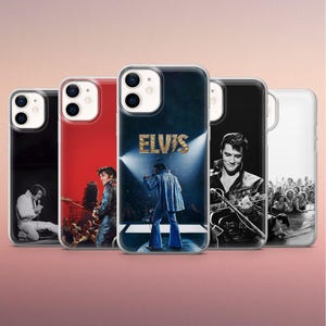 May include: A selection of phone cases displaying images of Elvis Presley in concert. The cases show Elvis in different poses, including on stage with the word "ELVIS" in gold, and other performance shots. The cases are in various colors.