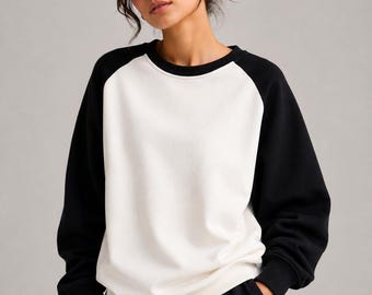 Damessweatshirt met raglanmouwen in zwart-wit, ronde hals, casual streetwear