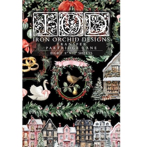 May include: Iron Orchid Designs transfer paper, Partridge Lane, featuring a black backdrop and festive illustrations. The design includes a bird in a wreath, a swan, and decorative houses. The sheet measures 20.3 cm x 30.5 cm.