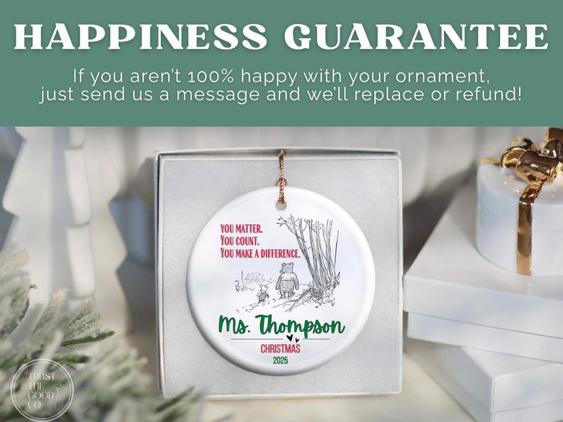 May include: A white ceramic Christmas ornament featuring a Winnie the Pooh illustration with the text "You Matter, You Count, You Make a Difference." The ornament is personalized with "Ms. Thompson" and "Christmas 2025."