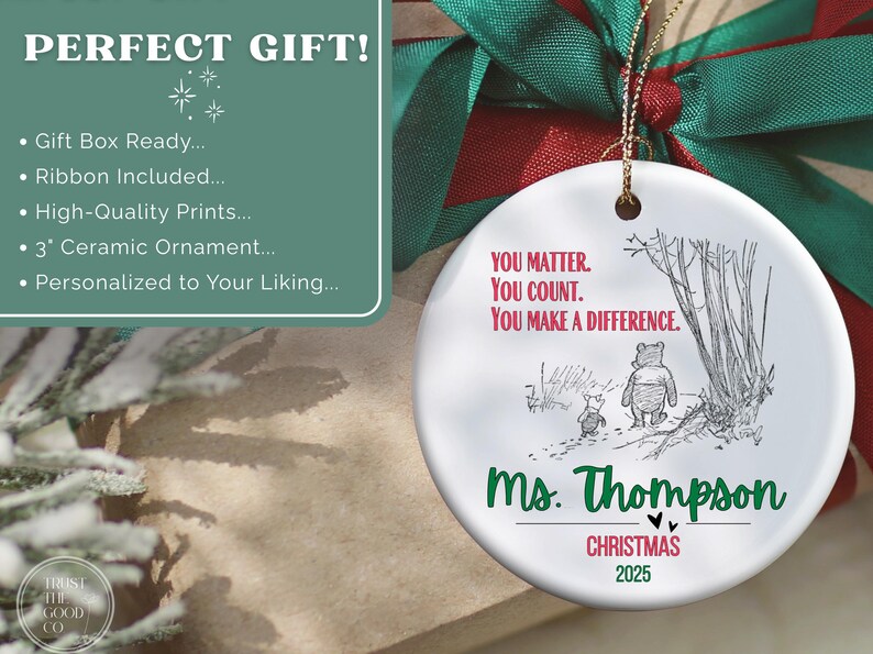 May include: A white ceramic Christmas ornament with a Winnie the Pooh illustration and the text "YOU MATTER. YOU COUNT. YOU MAKE A DIFFERENCE." The ornament is personalized with "Ms. Thompson" and "CHRISTMAS 2025."