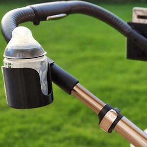 Portavasos y teléfono de mamá y papá
