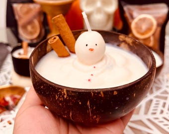 Schmelzender Schneemann in Kokosnuss Kerze