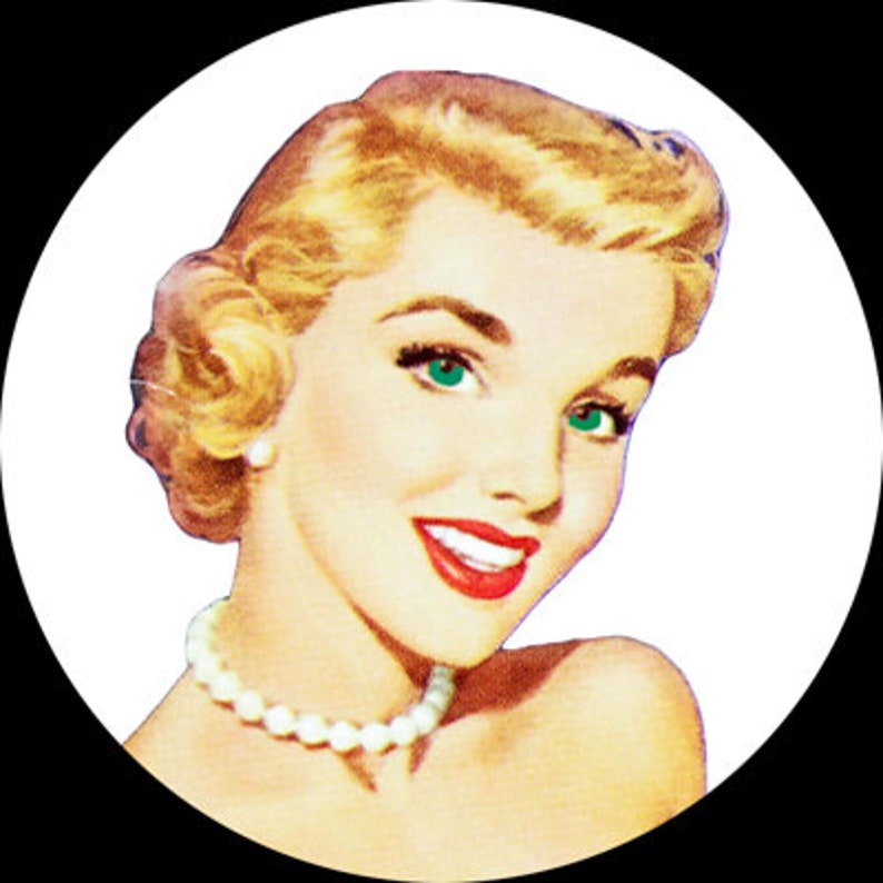 May include: A woman with blonde hair and green eyes is wearing a pearl necklace. She is smiling and looking to the side.