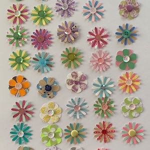 Die cut daisies, paper daisies, die cuts, handmade embellishments, die cut flowers, junk journal embellishments, scrapbook supplies