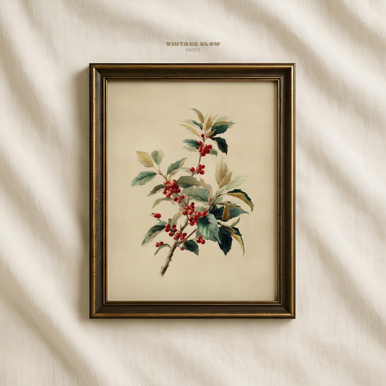 May include: A framed botanical print featuring a branch with red berries and green leaves. The artwork is set against a cream-colored background and framed in a dark, ornate gold frame. The text "VINTAGE GLOW PRINTS" is at the top.