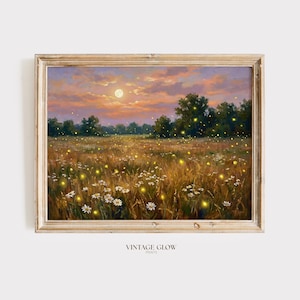 Puede incluir: Pintura de paisaje enmarcada que representa un campo de flores silvestres y hierba alta iluminado por luciérnagas bajo la luna llena. El cielo transita del naranja al morado, con árboles al fondo. El texto "VINTAGE GLOW PRINTS" está en la parte inferior.