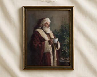 May include: A framed vintage print depicting Santa Claus in a red suit with white fur trim, holding a white cup. The artwork is in a gold-coloured frame, with the text "VINTAGE GLOW PRINTS" at the top.