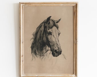 May include: A framed wall art print featuring a charcoal-style sketch of a horse head on a tan background. The text VINTAGE GLOW PRINTS is centered at the top. The artwork is enclosed in a weathered, light-colored wooden frame with a visible grain.