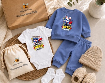 Baby Gift Box – (Super Hero Name) loving set with outfit, bodysuit, hat & socks for birth, christening or baby shower