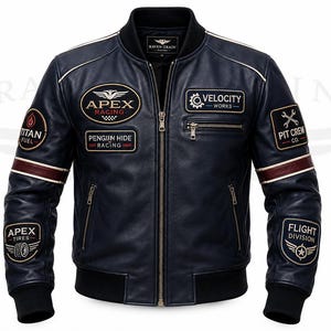 May include: A dark navy blue bomber jacket featuring a front zipper, black ribbed collar, cuffs, and hem. The jacket is decorated with various embroidered patches including Apex Racing, Velocity Works, Titan Fuel, and Flight Division logos.