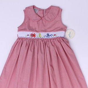 Hand‑embroidered smocked toddler girls dress. Girls summer dress with hand embroidered under the sea animals.