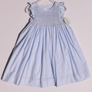 Smocked hand embroidered dress - Girls&#39; light blue , ruffle sleeves,  white and yellow zigzag hand embroidered and bow at the back