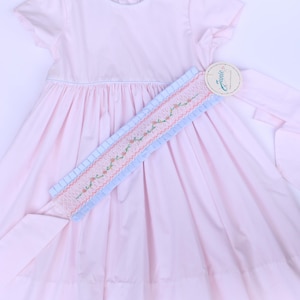 Smocked hand embroidered toddler girls dress -Pink sleeveless dress with embroidered pink flowers on removable sash.