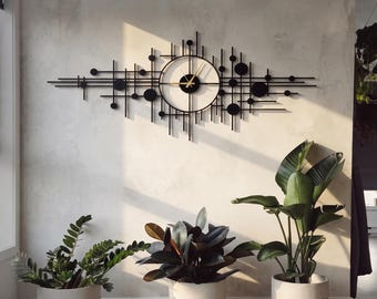 Geometrische metalen wandklok, grote zwarte moderne wandklok, eigentijdse minimalistische klok voor woonkamerdecoratie.