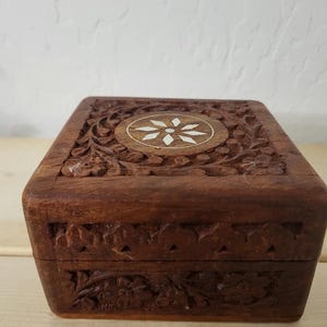 Hand-Carved Wooden Jewelry Box with Inlay Design