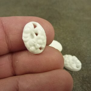 4pc White Vintage Japanese 14x10mm Pierced Floral Motif Oval Cabochons 1950's Textured Opaque NOS or bulk 1/4 gross
