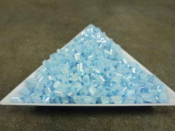 Transparent Teal Luster - Bugle, #2 25g Transparent Teal Luster - Bugle, #2 25g
