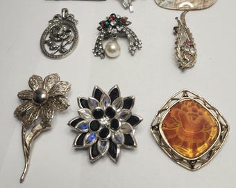Vintage, Lot of 8 pin, 1 pendant, average 1.5 inches, wearable, unsigned, gold and silver toned metals, some rhinestones- see photos