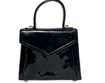 Bolsa de mano chica y chic de los 70s Frenchy de California