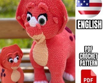 May include: A crochet pattern for a pink dinosaur with a white nose and green eyes. The pattern is available as a PDF download. The image also includes the text "PDF CROCHET PATTERN" and "PDF".