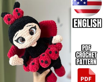 May include: Crochet pattern for a ladybug amigurumi toy. The toy is black with red spots and has a cute face. The pattern is available in PDF format.