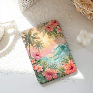 May include: A rectangular decorative item featuring a tropical beach scene. The design includes palm trees, hibiscus flowers, and a crashing wave. The color palette is dominated by pinks, greens, and blues, evoking a sense of warmth and relaxation.