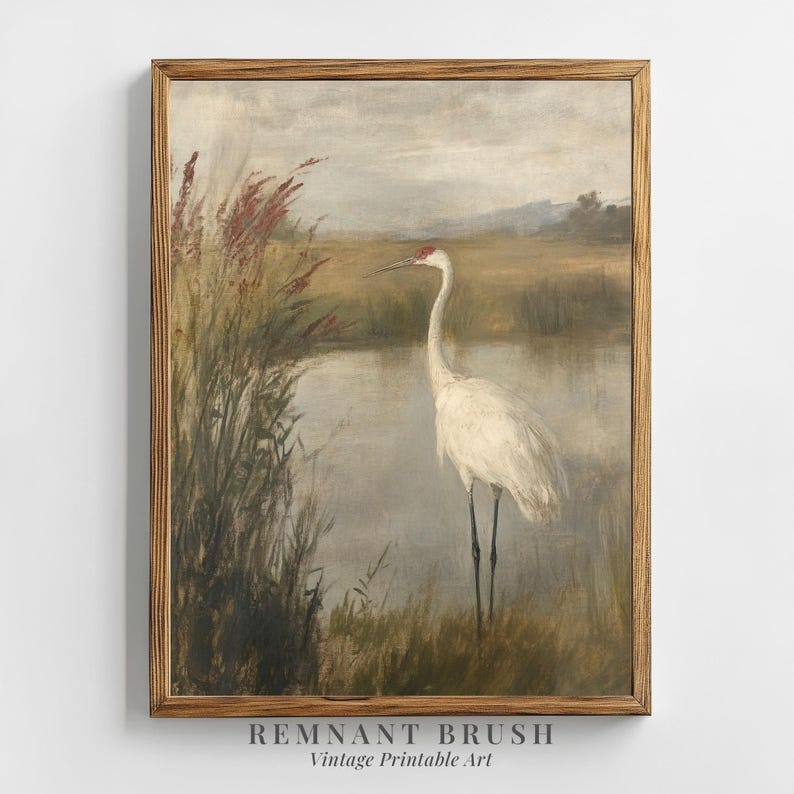 May include: A vintage painting depicting a white crane standing in a marsh with tall green reeds. The crane has a long, thin neck and a red beak. The background is a soft, muted blue and green.