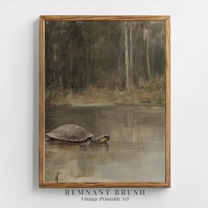 May include: A vintage painting of a turtle swimming in a lake with a forest in the background. The painting is framed in a wooden frame.