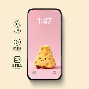 May include: A smartphone displays a pink wallpaper with a smiling, plush cheese wedge. The time 1:47 is shown at the top. Icons for live, MP4, and still wallpapers are on the left.