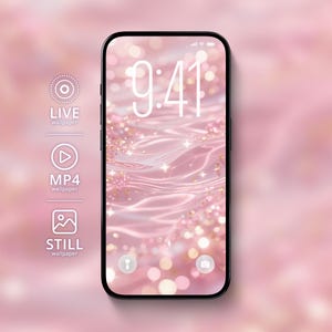 Könnte beinhalten: Ein Smartphone mit einem rosa, glitzernden Hintergrundbild, das die Uhrzeit 9:41 anzeigt. Das Telefon hat einen schwarzen Rahmen und befindet sich vor einem weichen rosa Hintergrund. Symbole für Live-, MP4- und Standbilder sind sichtbar.