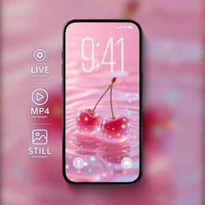May include: A smartphone displays a pink wallpaper featuring two cherries with colorful star-shaped accents. The time 9:41 is shown on the screen. The phone has a black frame and is set against a blurred pink background. The image also shows options for live, MP4, and still wallpapers.